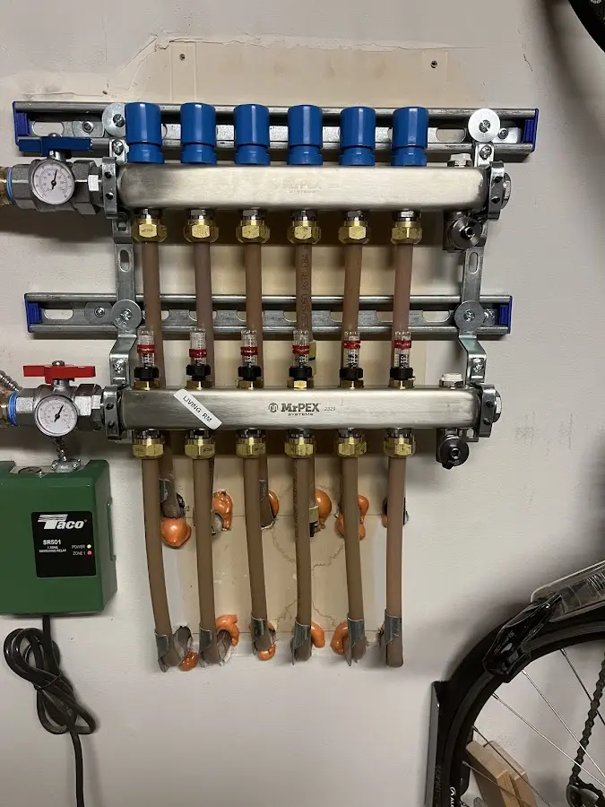 Plumber performing Gas Line Installation at a residential property in Ambridge